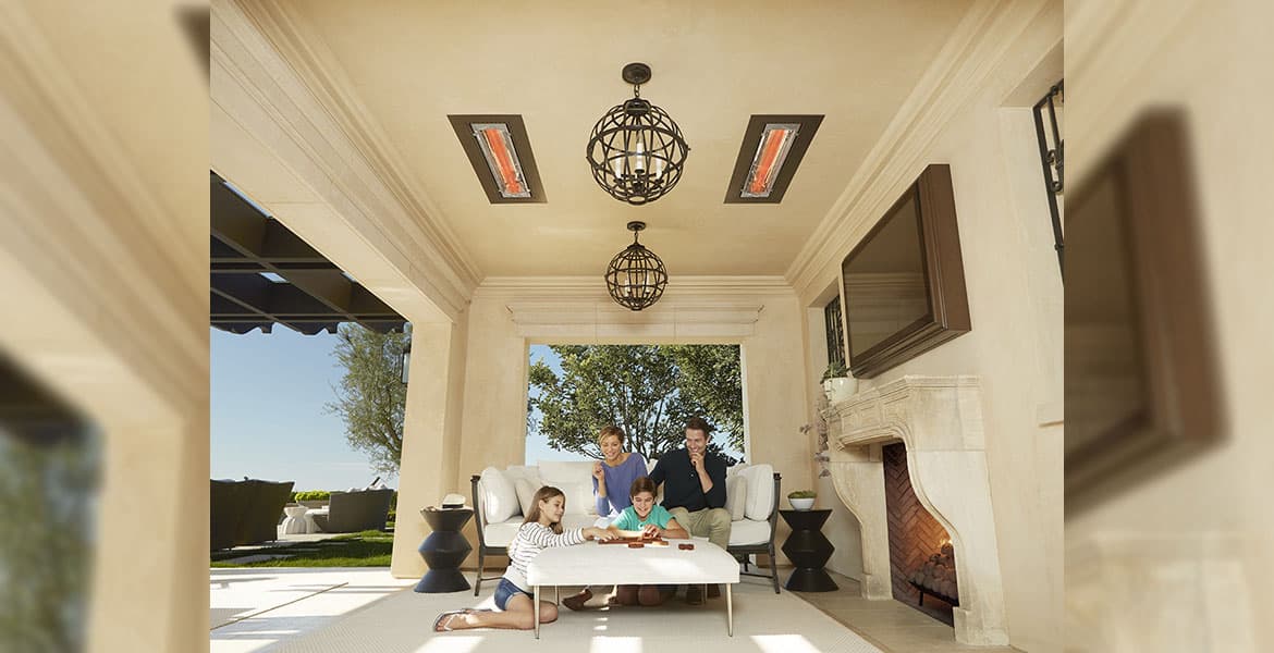 One Boy and Girl Playing Games with Mother and Father Under Two Flush Mounted Patio Heaters Under Covered Patio