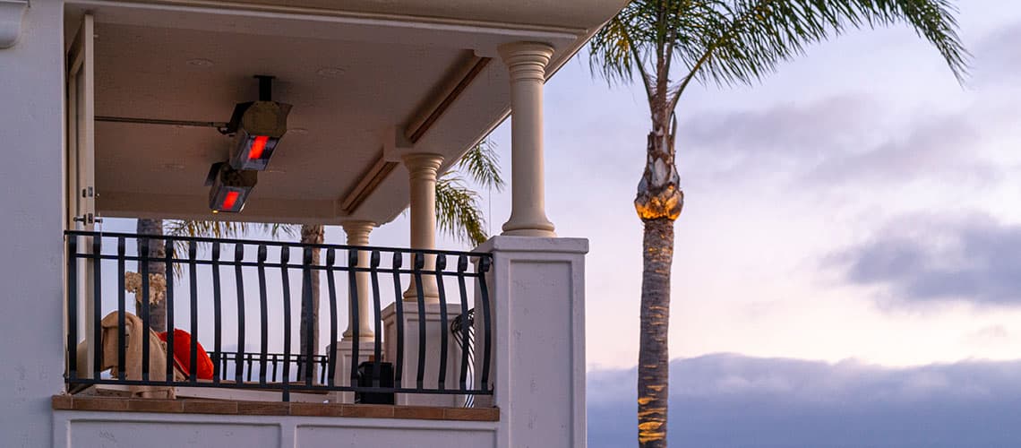 Two Outdoor Gas Patio Heaters Mounted to the Ceiling of an Outdoor Balcony